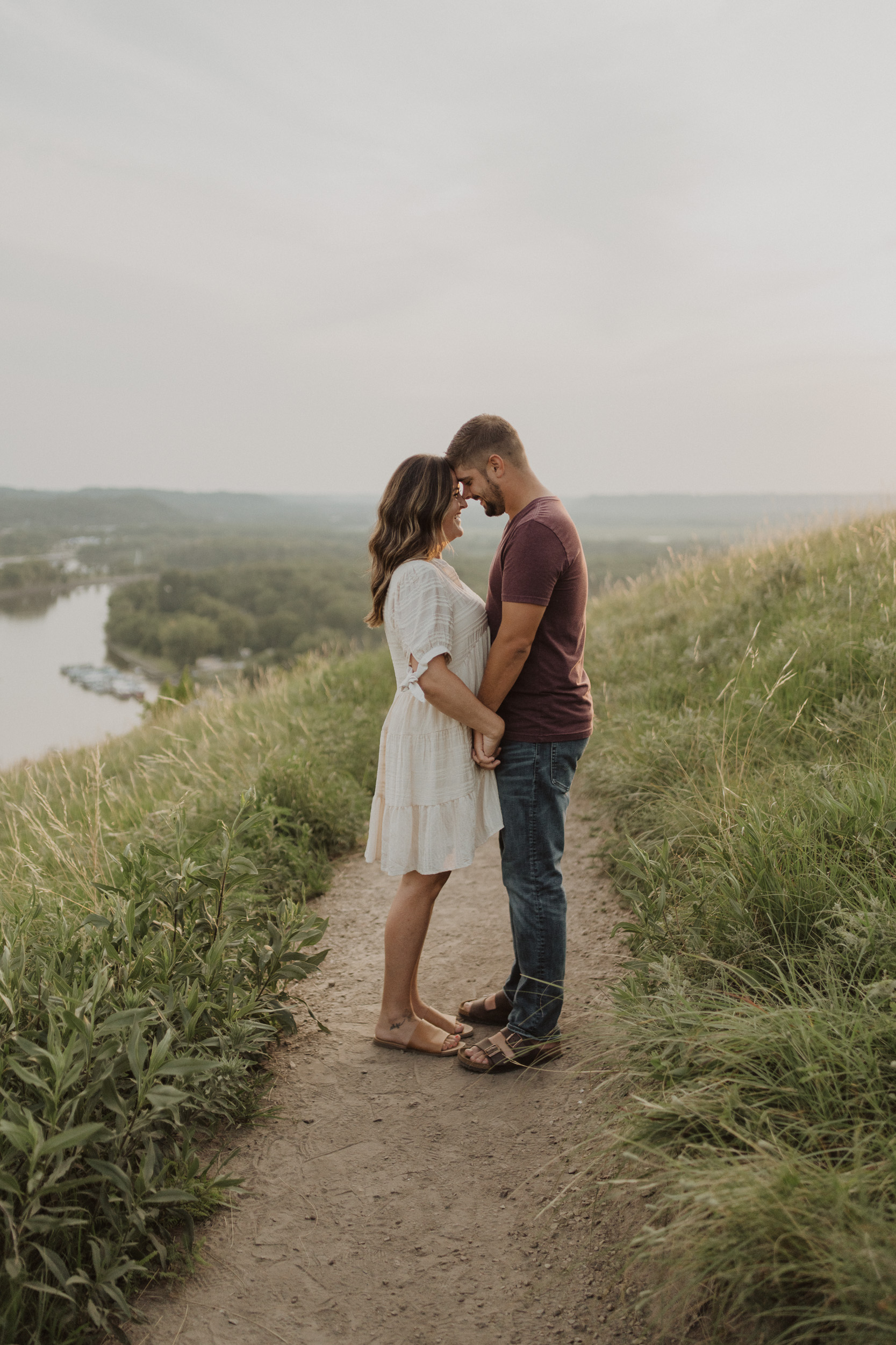 Caught golden hour at the top of bluffs in Redwing Minnesota for this adorable couple's engagement photos